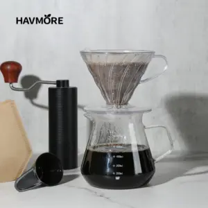 HAVMORE pour over coffee carafe and manual burr grinder set arranged as a premium artisanal coffee brewing setup
